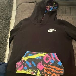 A boys Nike hoodie for ages six and seven it's considered a small